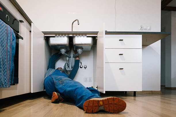 Professional Emergency Plumber technician working in Gunnison, MS